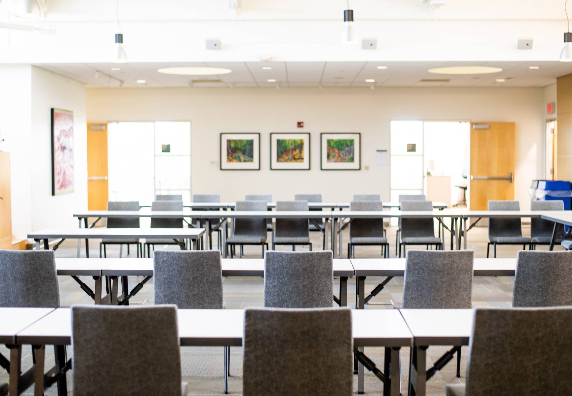 presentation room with tables and chairs